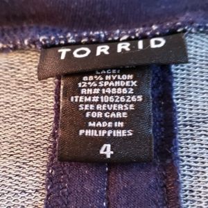 Torrid TOP..SHORT SLEEVE with pleat in back.plus s